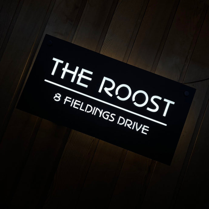 Illuminate Your Identity: The Benefits of Backlit House Signs with Laser-Cut Acrylic